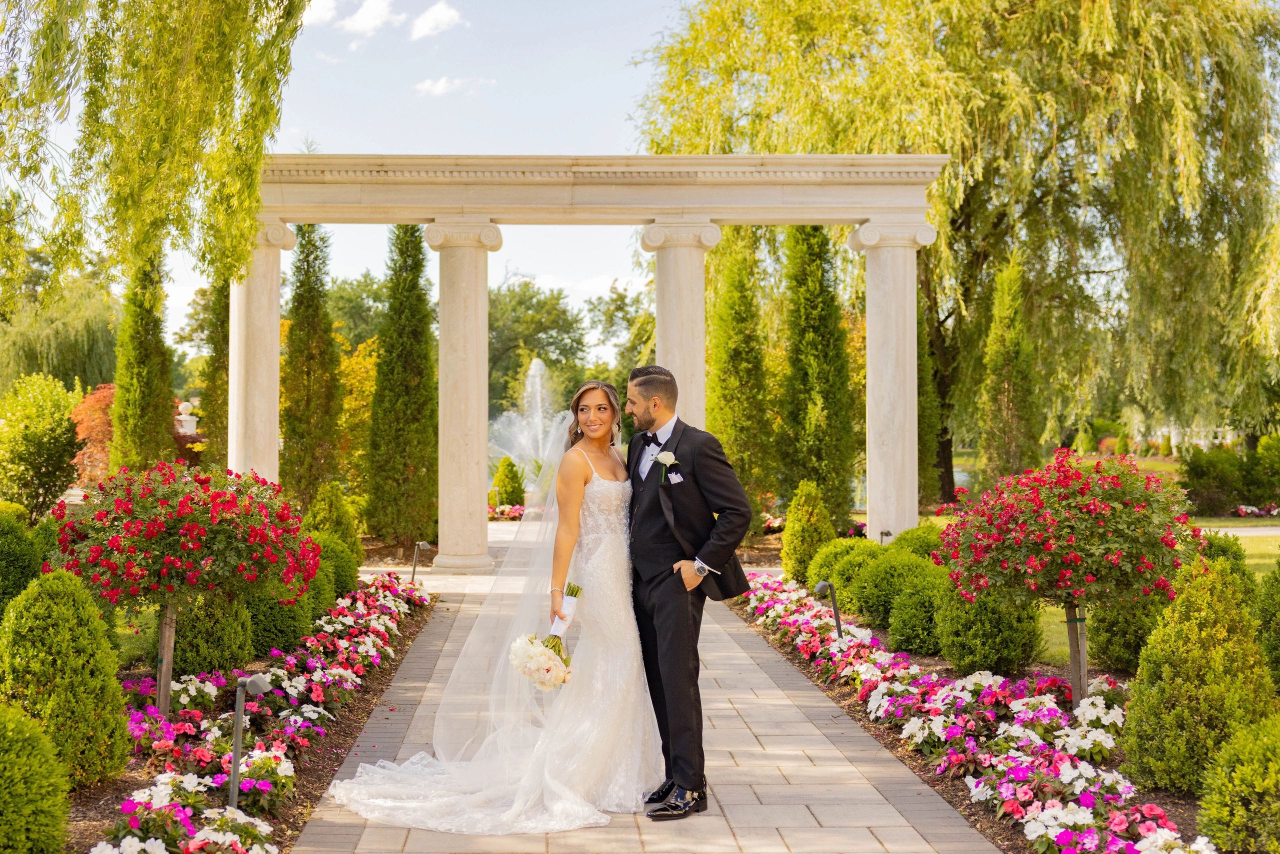 A newlywed couple sharing a quiet wedding-day moment